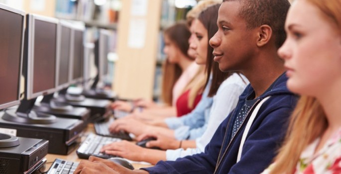 african american boy in computer class