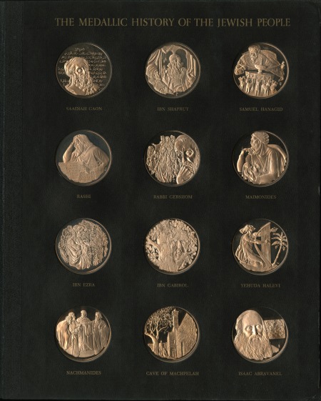 12 medals arranged on a black background