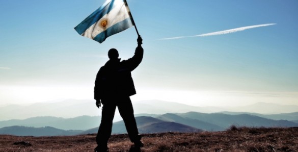 Man waving Argentine flag