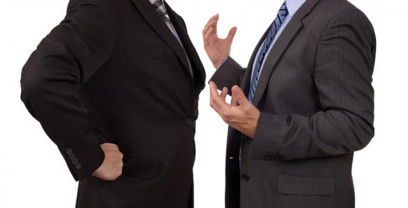 men in suits arguing
