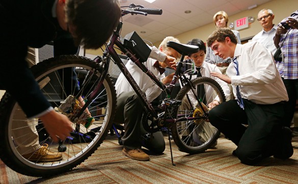 Students working on bike