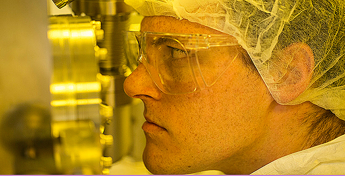 Scientist in clean room