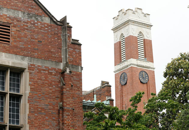 The clock on the Kirkland Hall tower is stopped at 12 o'clock. (John Russell/Vanderbilt)