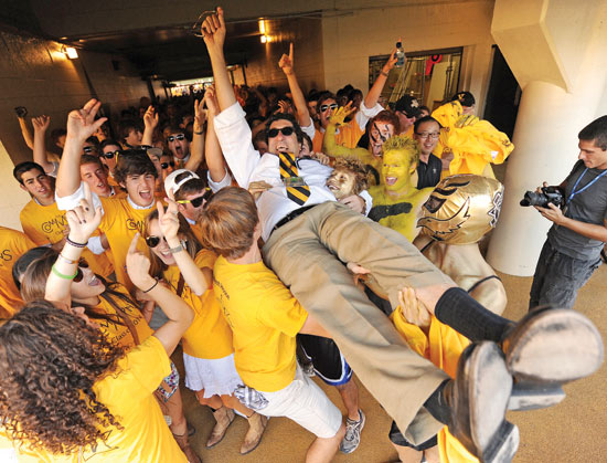 Chancellor Zeppos and students get carried away with school spirit before a football game. (John Russell/Vanderbilt).