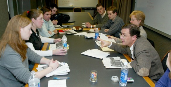 Michael Bess (far right), Chancellor's Professor of History, consults with junior faculty during a Center for Teaching-sponsored Teaching Visit. (image courtesy Center for Teaching)