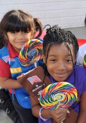 Girl Scouts with lollipops