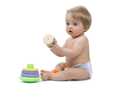 Baby boy playing with toys