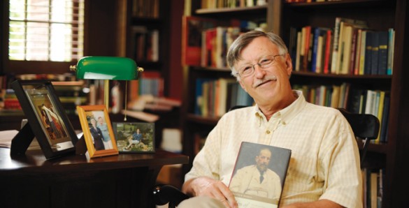 Frank Wcislo posing with book