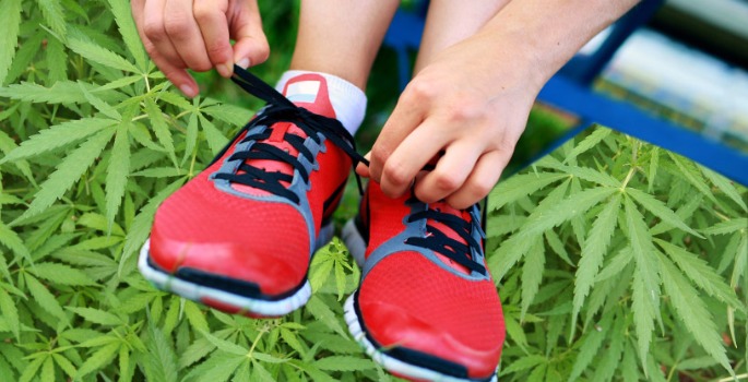 Running shoes superimposed on marijuana
