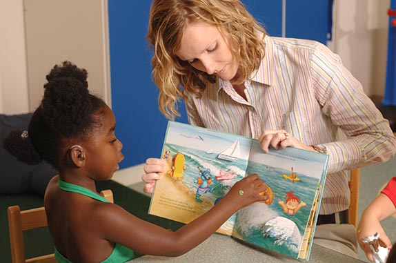 volunteer reading to child