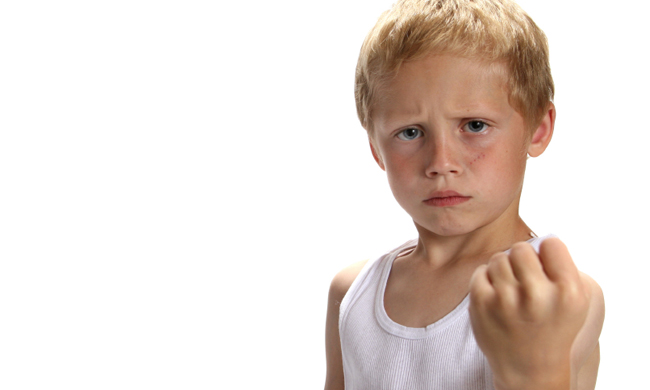 Child holding up his fist