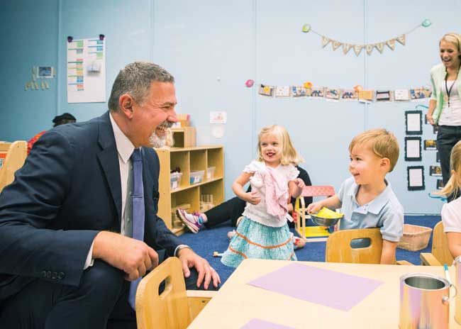 Michael Yudin interacts with young students at the Susan Gray School. (Joe Howell/Vanderbilt)