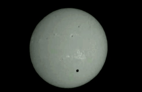 Venus and UFO transiting the sun