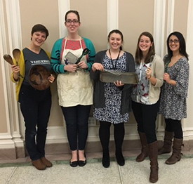 A team of graduate students (left to right) Kate Chazin, Danielle Bartelmay, Lillian Stiff, Sarah Reynolds, and Monica Rigor taught Adam to follow written recipes.