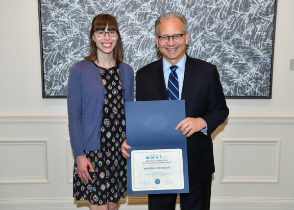 Pictured: Ashley Majewski (Coordinator, Division of Administration Programs) with Mayor Briley)