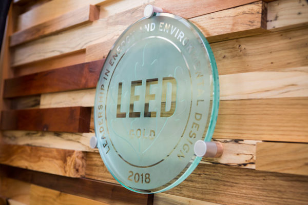 The U.S. Green Building Council presented Vanderbilt with a plaque designating the university’s Engineering and Science Building and Eskind Biomedical Library with LEED Gold status. (Susan Urmy/Vanderbilt)