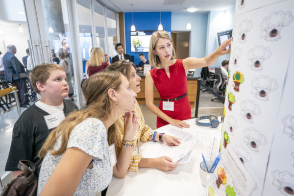 Guests at the opening of the Frist Center for Autism and Innovation learn about neurodiverse skills and approaches to innovation. (John Russell/Vanderbilt)