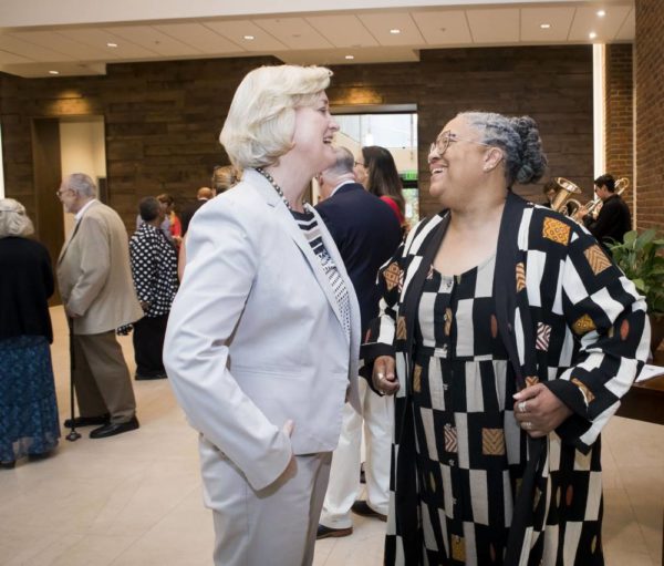 Interim Chancellor and Provost Susan R. Wente (left) and Divinity School Dean Emilie M. Townes at the ribbon-cutting ceremony for the Divinity School's recent renovation and expansion. (Susan Urmy/Vanderbilt)