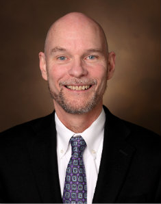 headshot of Graduate School Dean Mark Wallace