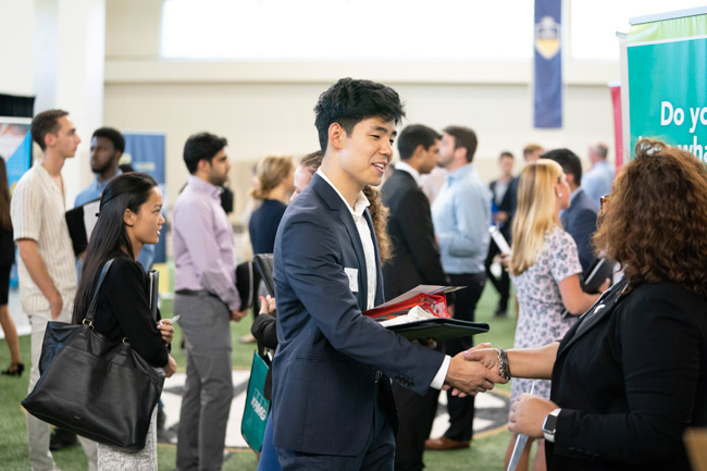 Top companies such as AllianceBernstein, Amazon, ExxonMobil, Defense Intelligence Agency, Lilly USA, Microsoft Corporation, Teach for America and Vineyard Vines were represented at the fall Career Fair on Sept. 11. (Joe Howell/Vanderbilt)