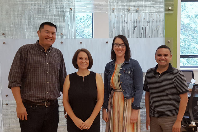 Tara McKay (second from left) will lead the study in collaboration with (l-r) Christopher “Kitt” Carpenter, Lauren Gaydosh and Gilbert Gonzales. All four work with the LGBT Policy Lab, an initiative funded through a 2017 Trans-Institutional Programs award. (Vanderbilt University)