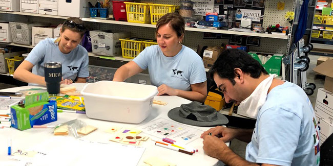 During their time at LP Pencil Box, the Humphrey Fellows bundled supplies and stocked the program’s storeroom. (Vanderbilt University)