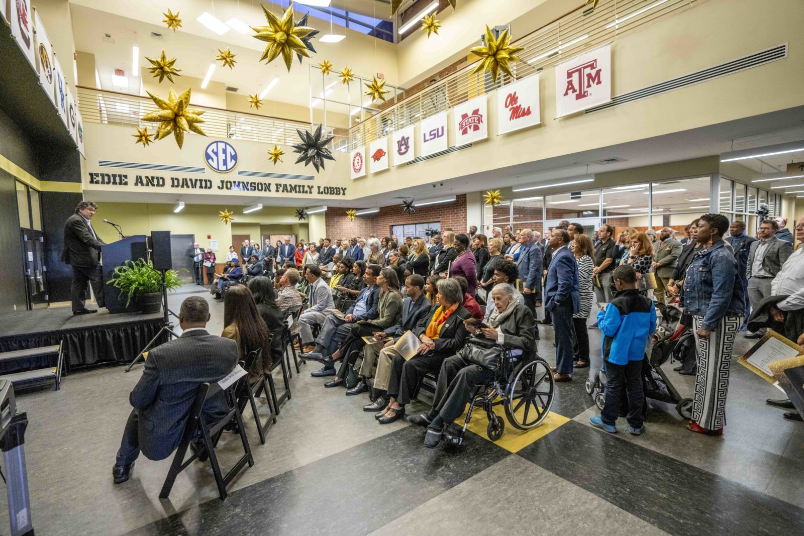 Friends and family of David Williams gather in the SEC Johnson Lobby of the David Williams II Recreation and Wellness Center. (John Russell/Vanderbilt University)