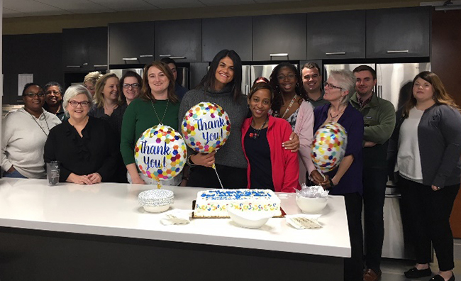 Human Resources employees observe "Thankful Thursday" with cake. (Vanderbilt University)