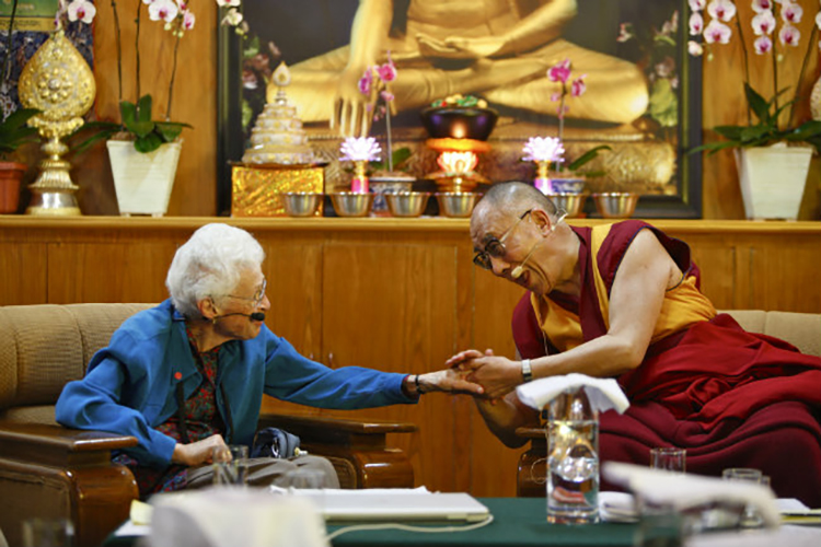 Sallie McFague meeting the Dalia Lama during a 2011 conference on ecology, ethics and interdependence.