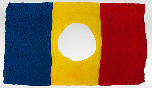 Romanian flag with Communist emblem removed was symbol of the 1989 Romanian Revolution (courtesy of the Michelson Collection)