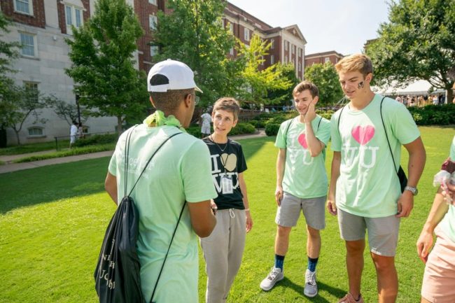 Dean of The Martha Rivers Ingram Commons Melissa S. Gresalfi talks with student VUceptors as they assist first-year students with move-in (photo by John Russell at Vanderbilt University)