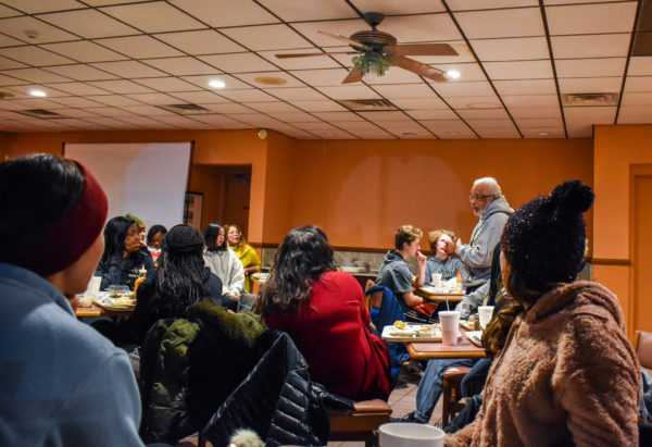 Freedom Rider and former council member Kwame Lillard speaking with participants on the Freedom Ride Tour (Jalen Blue/Vanderbilt)