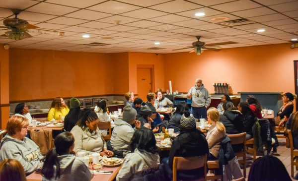 The Freedom Ride Tour made a stop at Swett's Restaurant, where participants engaged in reflection with Freedom Rider Kwame Lillard. (Jalen Blue/Vanderbilt)