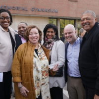 Candice Storey Lee, Gail Williams and Andrew Maraniss with family and friends of Perry Wallace at the Perry Wallace Way dedication ceremony. (John Russell/Vanderbilt)