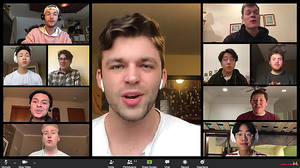 a computer screen shot of students in remote locations singing together over a video conferencing platform