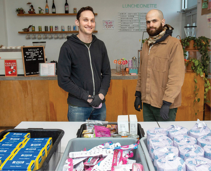 photo of Flip Biddelman and business partner Nate Adler in their restaurant