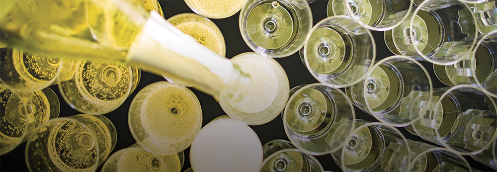 photo of champagne flutes viewed from above