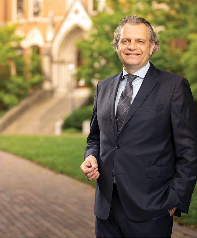 photo of Chancellor Daniel Diermeier in front of Kirkland Hall