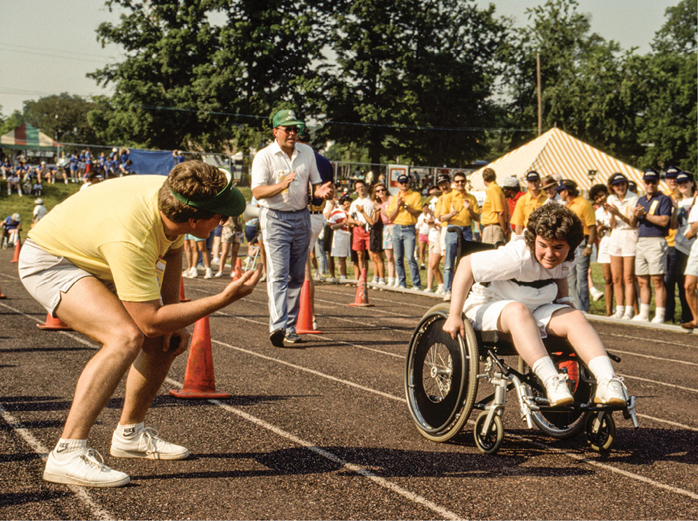 photo of Special Olympian competing in a wheelchair event