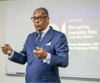 Vice Chancellor André L. Churchwell conducting training on recognizing unconscious bias 