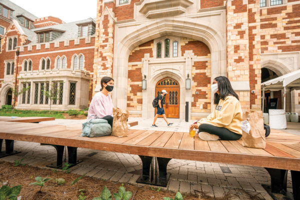 Students share lunch outside E. Bronson Ingram College.