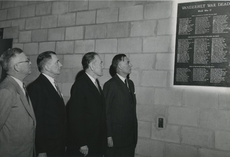 Memorial Gymnasium, dedicated on Dec. 6, 1952, commemorates Vanderbilt veterans who served in World War II. Pictured (l-r) are Charles S. Ragland, general chairman of the Memorial Gymnasium Fund Campaign, 1946-47; James G. Stahlman, chairman of the Board of Trust Gymnasium Committee, 1945-46; Charles Madison Sarratt, dean of students from 1941 to 1946 and vice chancellor from 1946 to 1957; and Chancellor Harvie Branscomb. (Vanderbilt University Special Collections and University Archives)