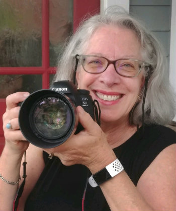 Photographer Kats Barry with her Canon camera