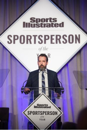 Mark Bechtel at podium announces SI Sportsperson of the Year