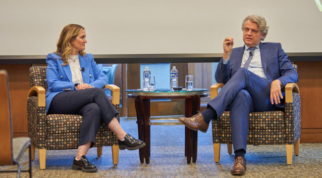 Marketing professor Kelly Goldsmith (left) and Chancellor Daniel Diermeier (right) discuss his book, Reputation Analytics, at the Central Library Community Room on April 26. (Harrison McClary/Vanderbilt)
