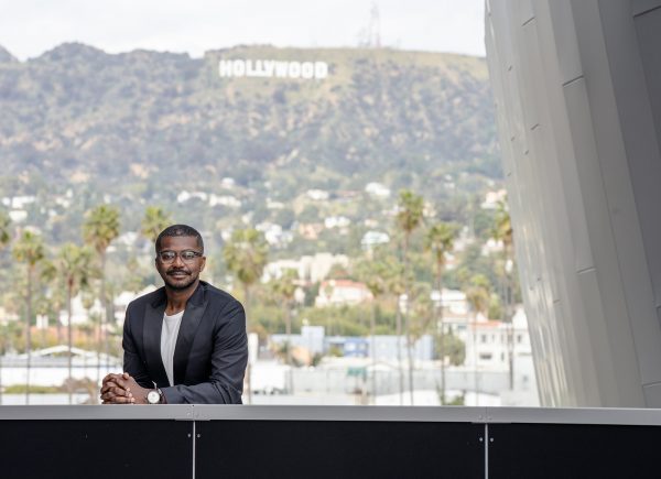 Filmmaker Mason Richards with the iconic HOLLYWOOD sign seen over his shoulder