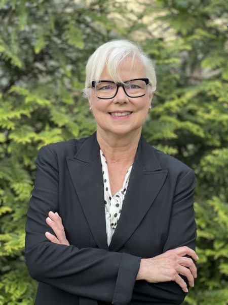 environmental photo of Alice W. Hunt wearing black jacket 