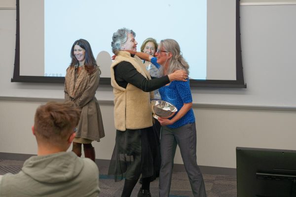 Camilla Benbow hugs Meg Saylor on winning the Chancellor's Cup