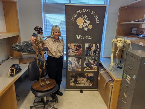 woman in lab with evolutionary props