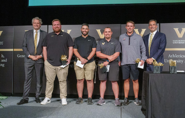 Dare to Grow Prize winners Brett Herring, Jordan Hunt, John Mardirosian, Trent Pearson and Phillip O. Brown with Chancellor Daniel Diermeier (far left) and Vice Chancellor Eric Kopstain (far right).